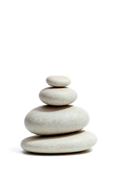istock Zen stones pyramid isolated on white background. Vertical photo 1351878691