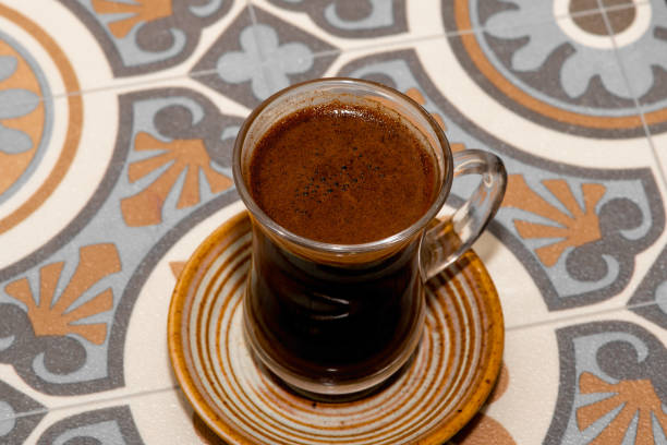 istock Turkish coffee cup, traditional coffee, background wooden table, Turkish coffee, empty area. 1351884114