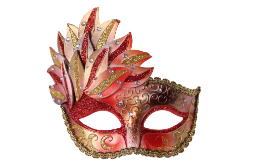 Venice mask. Colored venetian masks on a shop window. Carnival in Venice. Tourism in Italy. Celebration atmosphere. Festive background. Style and fashion