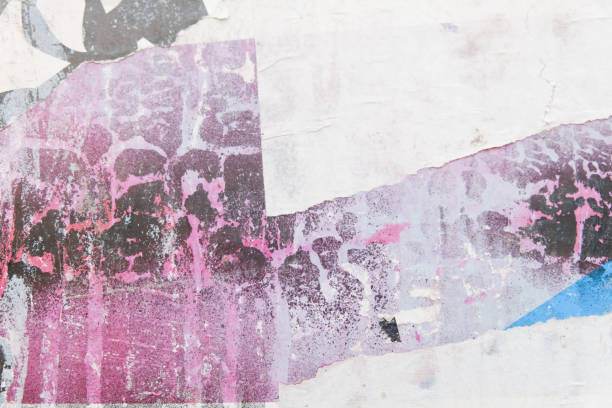 istock Torn street poster background. Abstract weathered paper texture. 1351884379