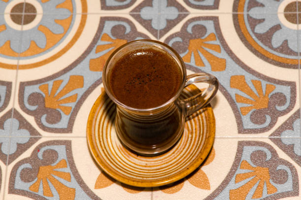 istock Turkish coffee cup, traditional coffee, background wooden table, Turkish coffee, empty area. 1351886264
