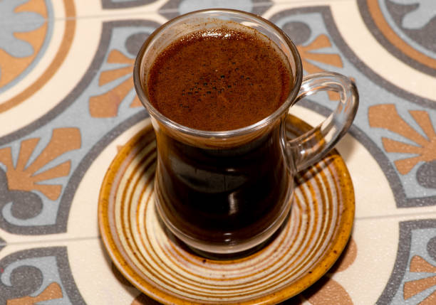 istock Turkish coffee cup, traditional coffee, background wooden table, Turkish coffee, empty area. 1351886266