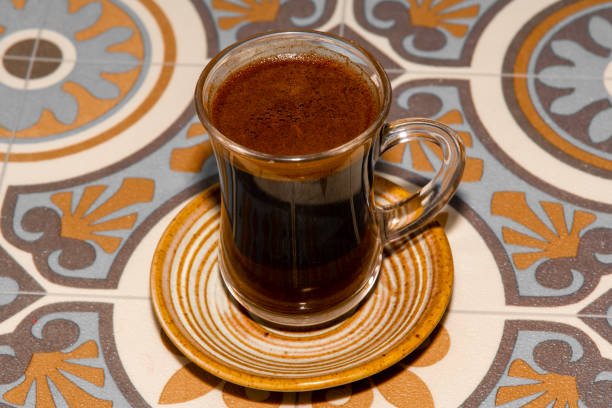istock Turkish coffee cup, traditional coffee, background wooden table, Turkish coffee, empty area. 1351886274