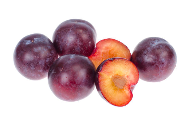 istock Ripe round sweet plum on white background 1351889797