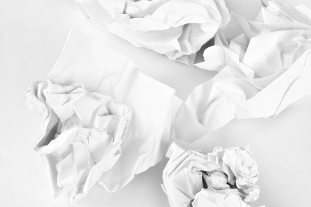 istock Crumpled paper. Various paper balls on a white background 1351891010