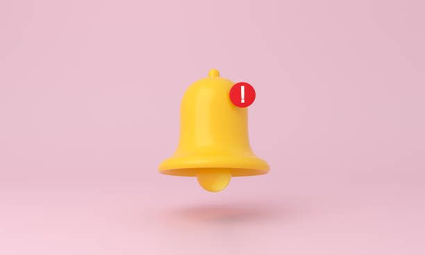 istock Yellow notification bell on pink background. minimal icon. 1351893961