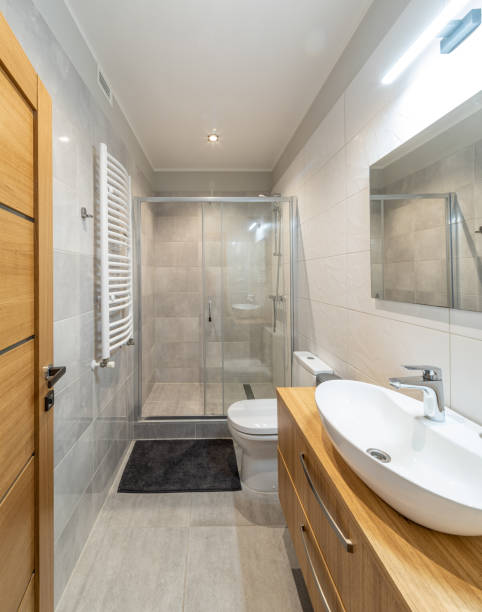 istock Modern interior of bathroom in luxury apartment. White sink. 1351895541