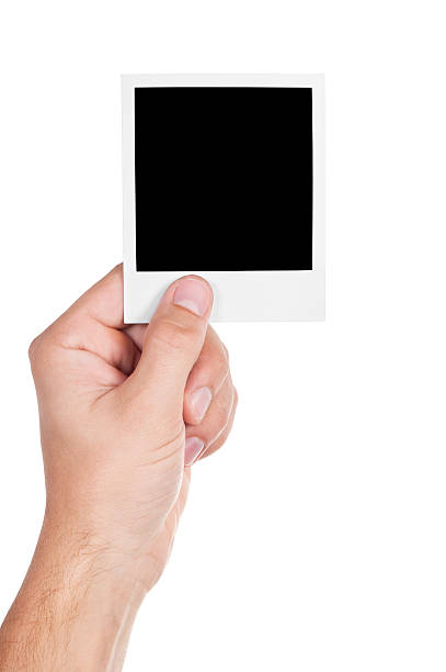 istock one instant photo in hand 135189652