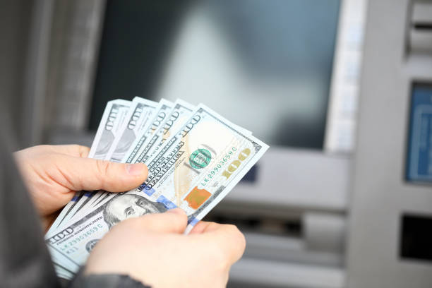 istock Successful male holding salary 1351899566