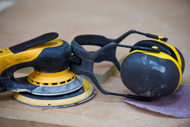 istock Electric sander and ear defenders for use in building and construction trade 1351900539