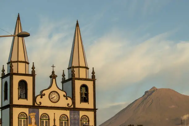 View to Pico mountain, Madalena church, Azores travel destination.