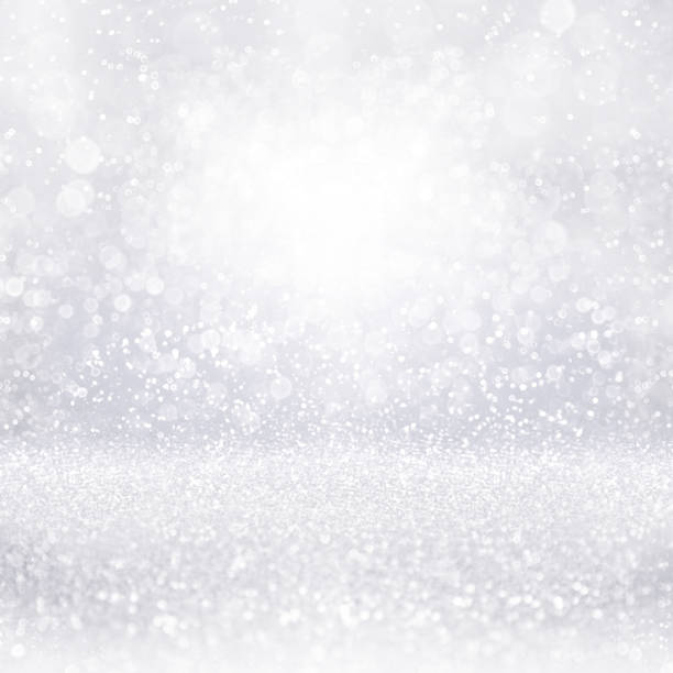 istock Silver white diamond jewelry background or Christmas snow glitter 1351902882