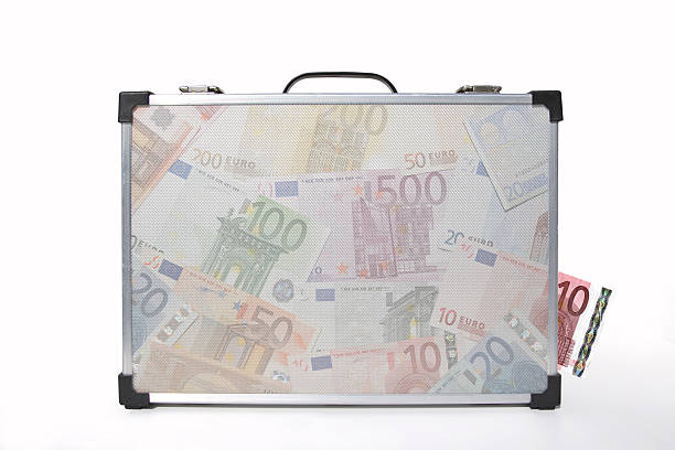 suitcase full of money stock photo