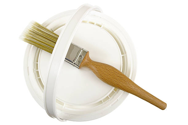 istock Paintbrush On Top Of Paint Can 135190529