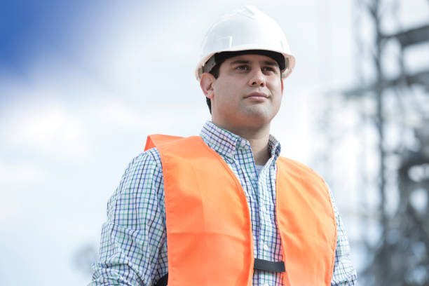 istock Engineers checking electric power station, review blueprints and statistics.. 1351907690
