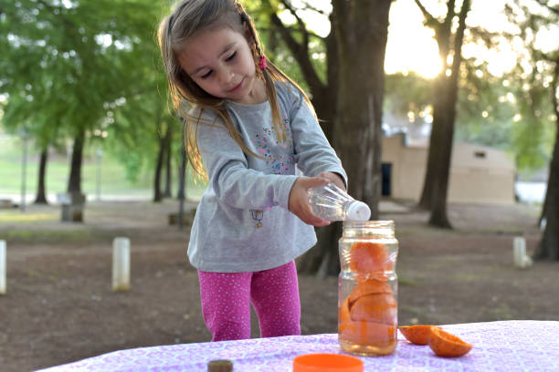 istock girl with orange peels 1351912400
