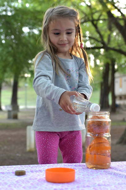 istock girl with orange peels 1351913550