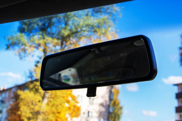 istock Rearview mirror in the car in autumn 1351913784