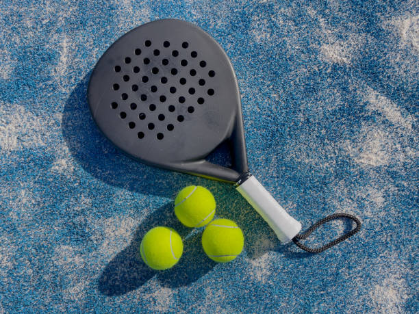 padel tennis, padel racket sport padel tennis court with rackets and balls racquet stock pictures, royalty-free photos & images