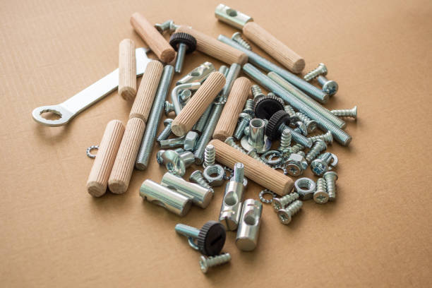 istock Assembly furniture tool kit with screw dowel and bolt 1351935077