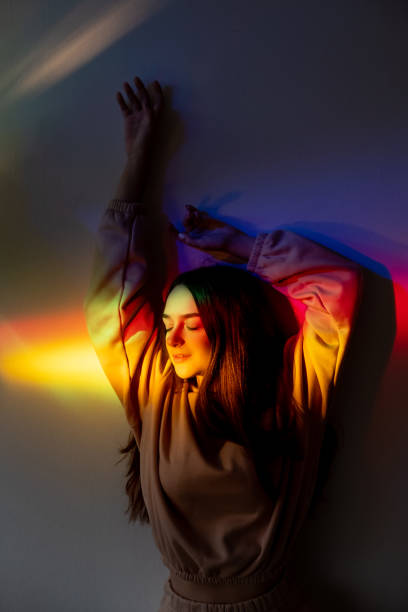 istock neon dreamful girl inner peace freedom rainbow 1351935185