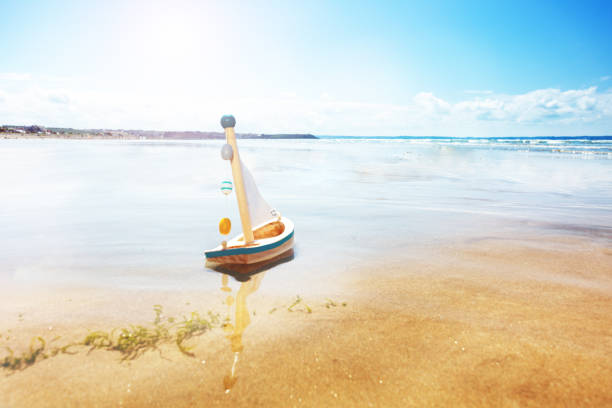 Transparent canoe on the beach