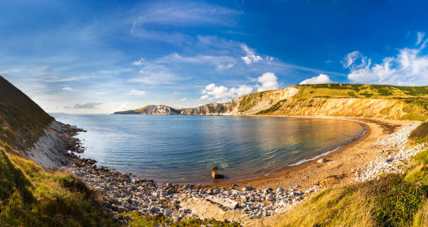 Coloured sands on the beach and cliffs at Worbarrow Bay stock photo