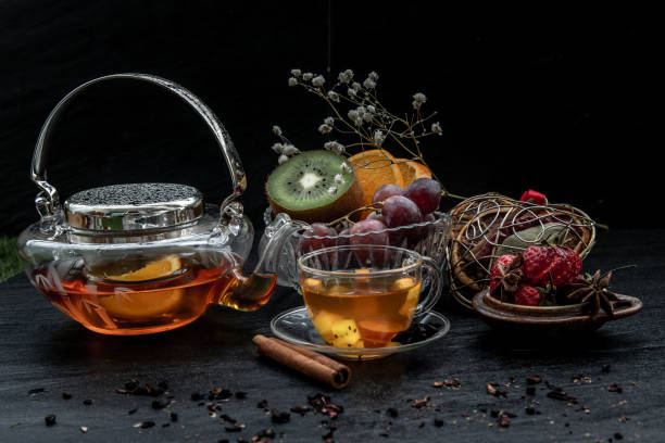 istock Glass of freshly brewed fruit and herbal tea. 1351936989
