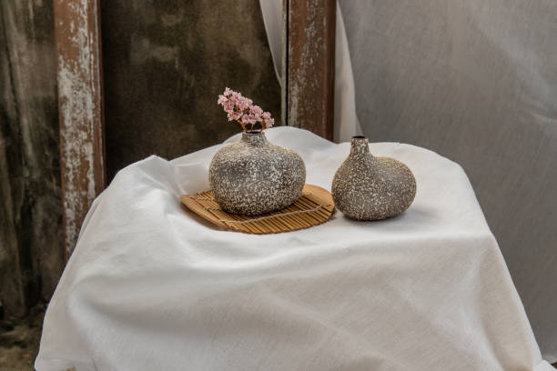 istock Dried flowers in Handmade Double Ceramic Vases on table. 1351938786