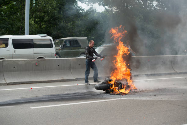 burning motorcycle stock photo