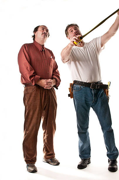 Contractor Discussing Needs with Customer stock photo