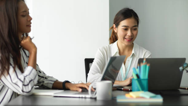 istock Female manager working with her female employee 1351951937