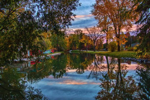 istock Sunrise Fall Reflections On A Calgary Park Lake 1351955687