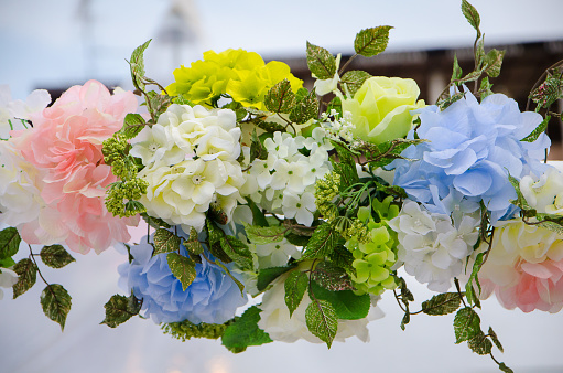 Bright and delicate flowers at the wedding ceremony.