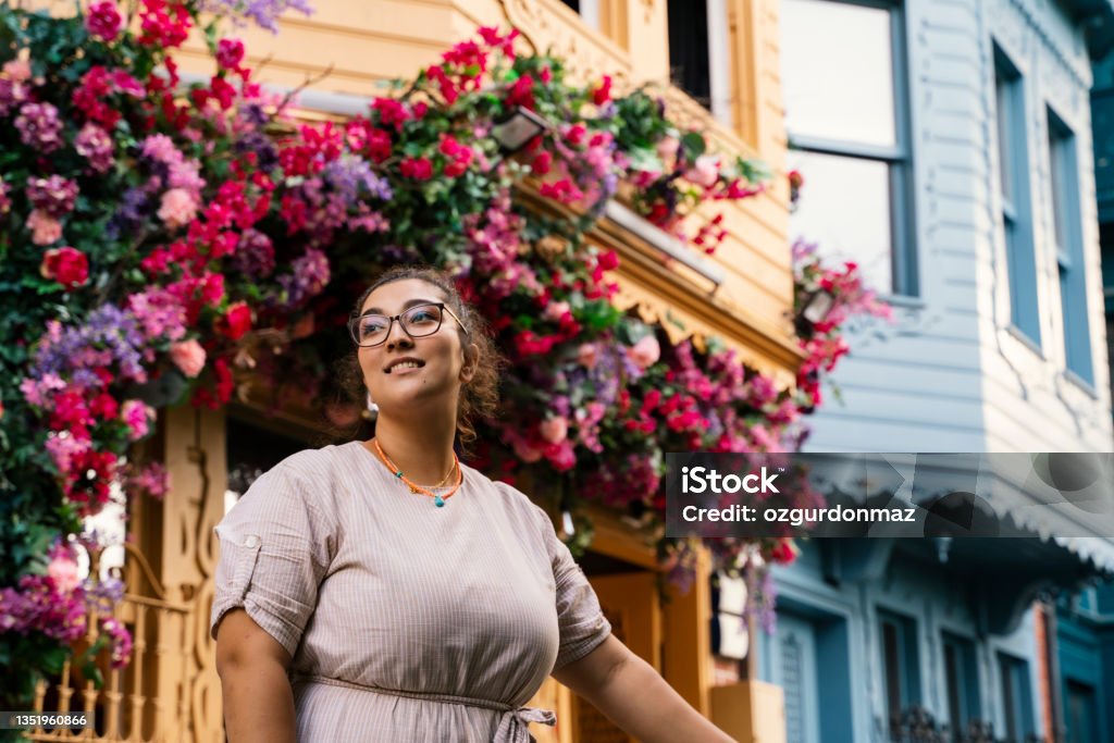Young woman street portrait in Kuzguncuk, Istanbul Flower Stock Photo