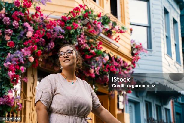 Young Woman Street Portrait In Kuzguncuk Istanbul Stock Photo - Download Image Now - Flower, Multi Colored, House