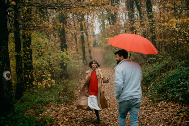 istock Walking adventure in a misty forest 1351964122