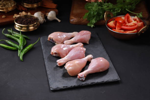 istock Raw chicken drum stick or leg pieces 1351966476