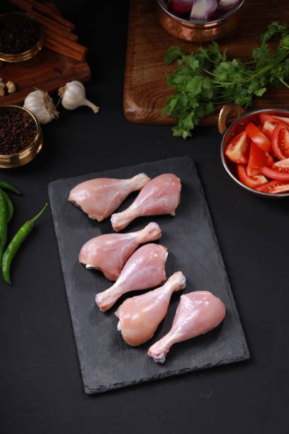 Raw chicken drum stick or leg pieces