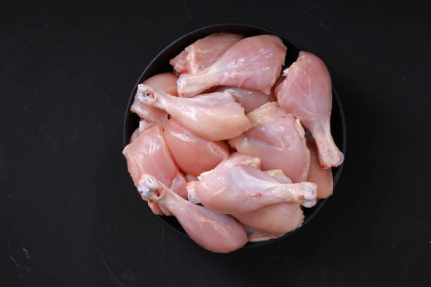 Raw chicken biriyani cut without skin stock photo