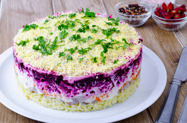 istock Vegetable salad with beetroot and round herring. Studio Photo 1351966906