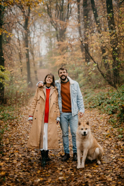 istock Young family with their dog 1351968465