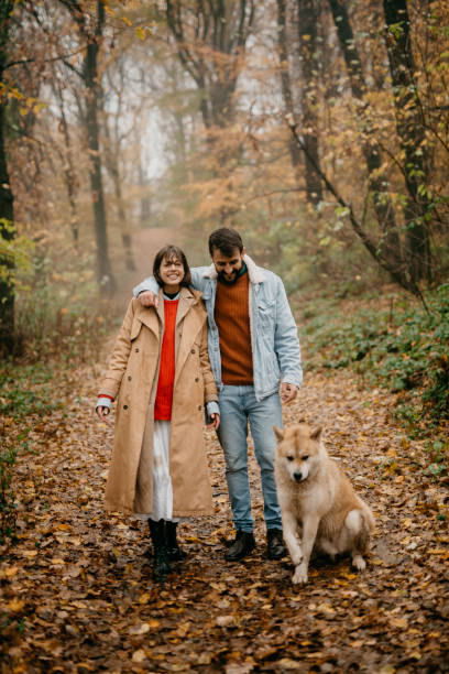 istock Young family with their dog 1351968629