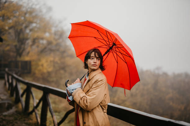 istock Umbrella is protecting me from a bad weather 1351969521