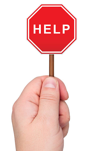 istock Warning sign with word HELP holds in hand. 135197284
