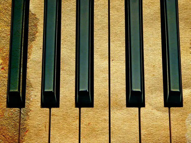 Detail of a Piano Keyboard with a Old Paper Texture