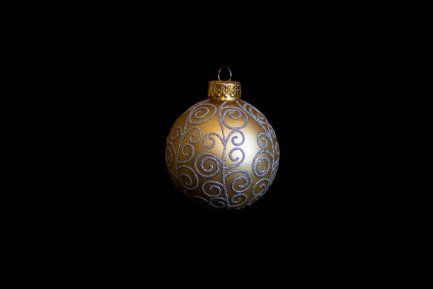 istock Luxury gold Christmas ornament against black background 1351978904