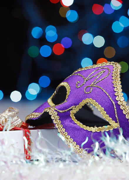 istock The Venetian mask on a abstract  background 135198184
