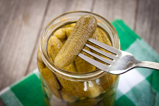 Pickled Cucumber Jar of pickled cucumber preserved food stock pictures, royalty-free photos & images