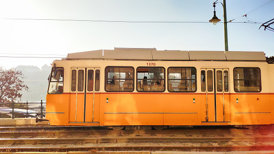 Historic yellow tramway close up view in Budapest, Hungary